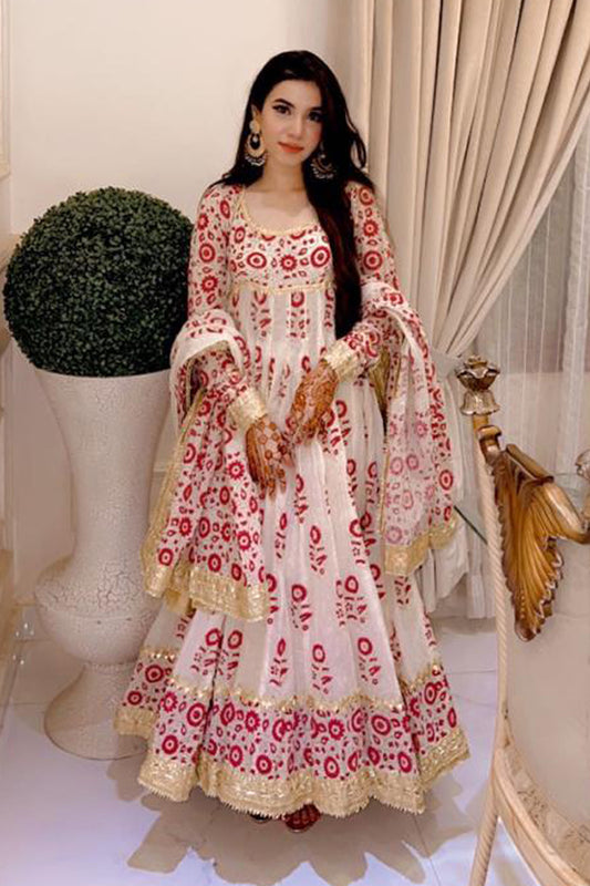 Bia peshwaz in rich red and gold block print, finished with traditional gota detailing—crafted exclusively by The PinkTree Company.